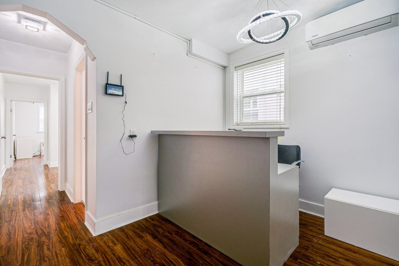 Reception area and counter of the second-floor space at 3223 Yonge St