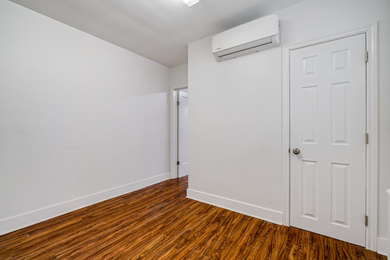 Private room with wall-mounted air conditioning in the second-floor space at 3223 Yonge St