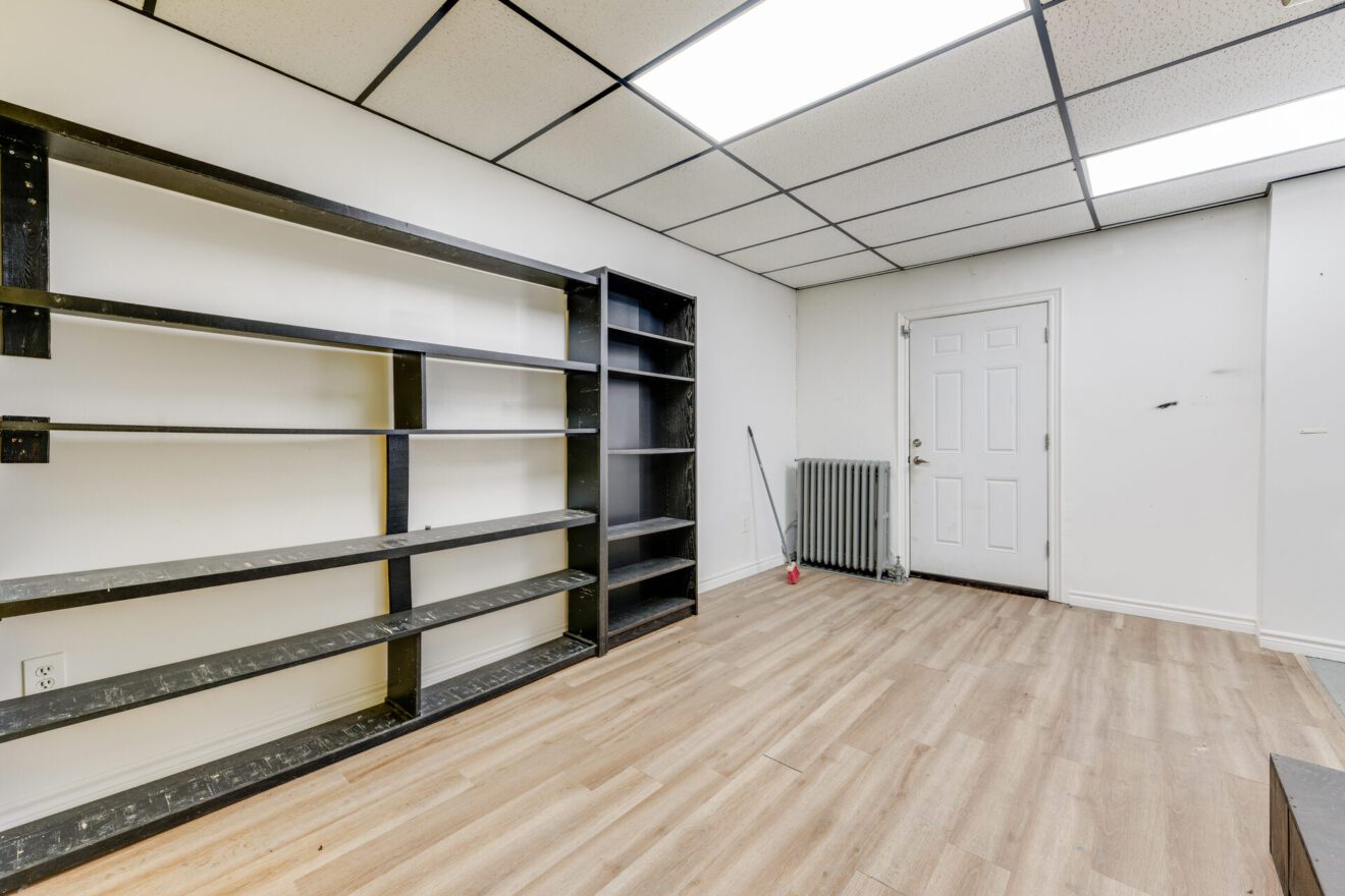 Room with built-in shelving at 539 St Clair Ave W second-floor commercial space