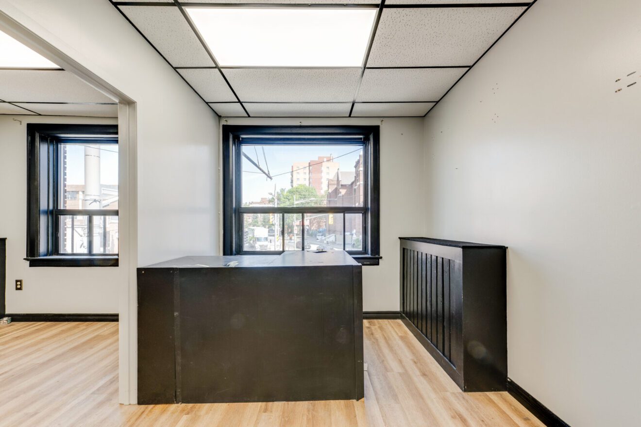 Front room with windows overlooking St Clair Avenue West at 539 St Clair Ave W