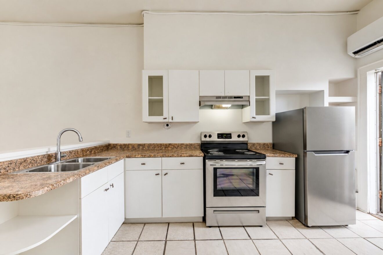 Kitchen in a two-bedroom residential suite, 1378 Queen Street West