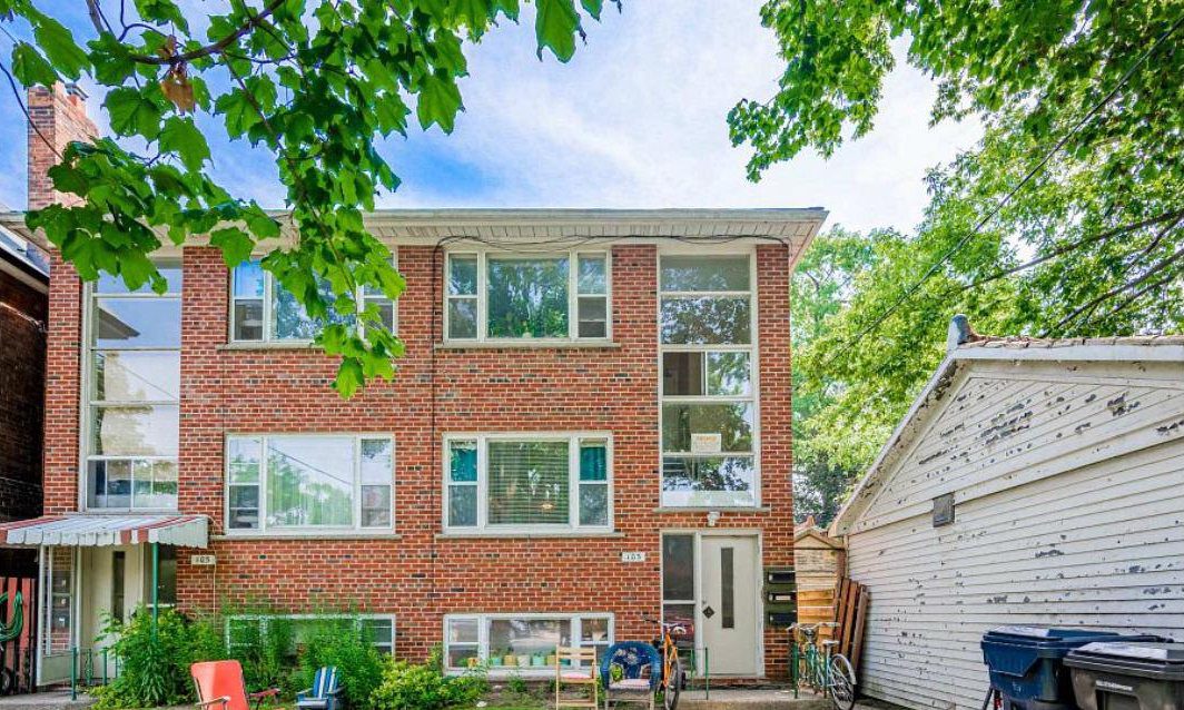 103 & 105 Gilmour Ave, three-storey brick six-unit building, front exterior