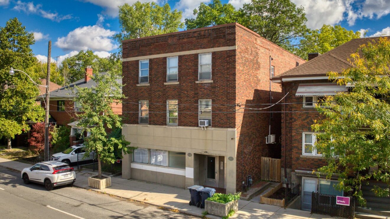157-159 Jane St, three storey brick mixed use building on Jane Street